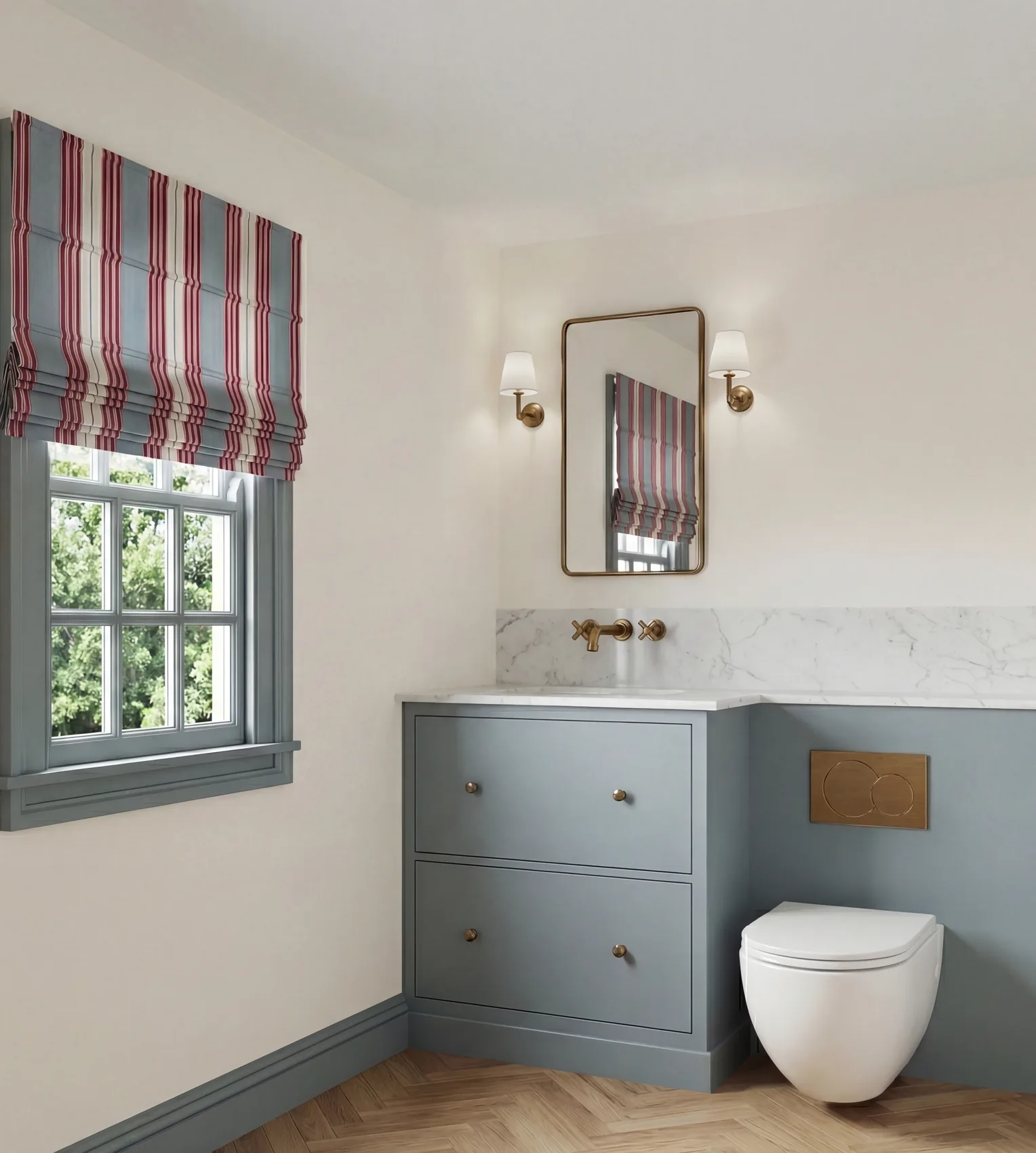 Bathroom with blue cabinetry, brass fixtures and a striped blind