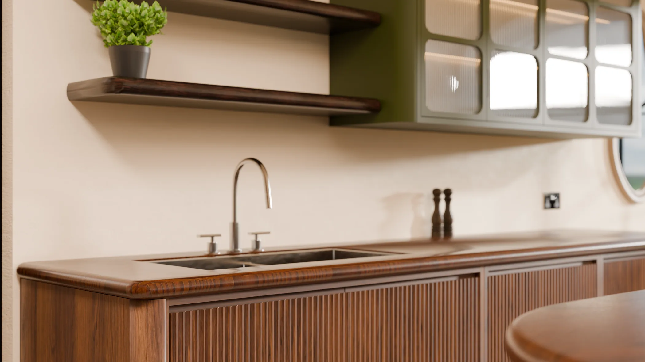 Sink and timber worktop detail in a warm kitchen
